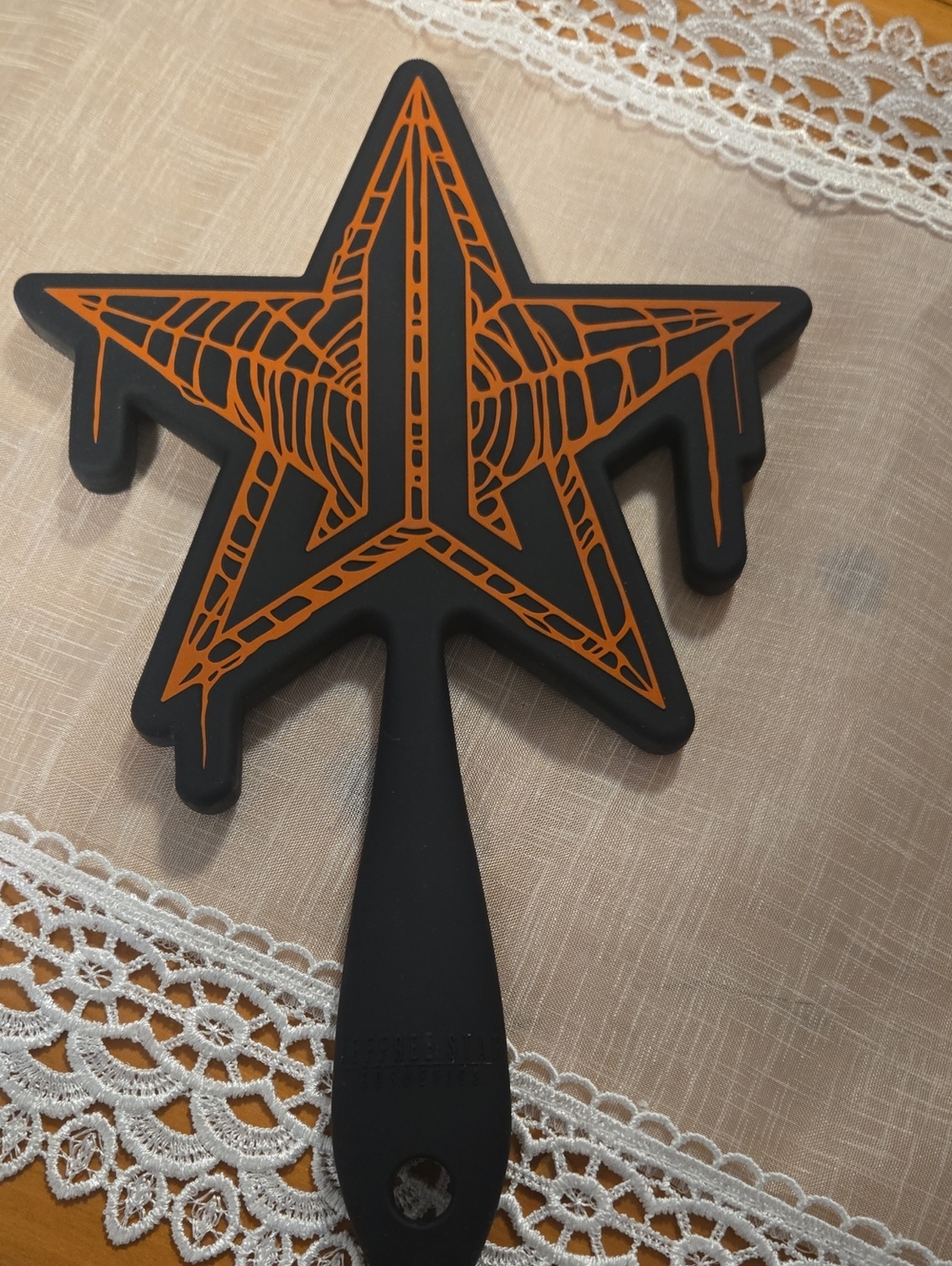 Jeffree Star Black and Orange Drip Star Hand Mirror